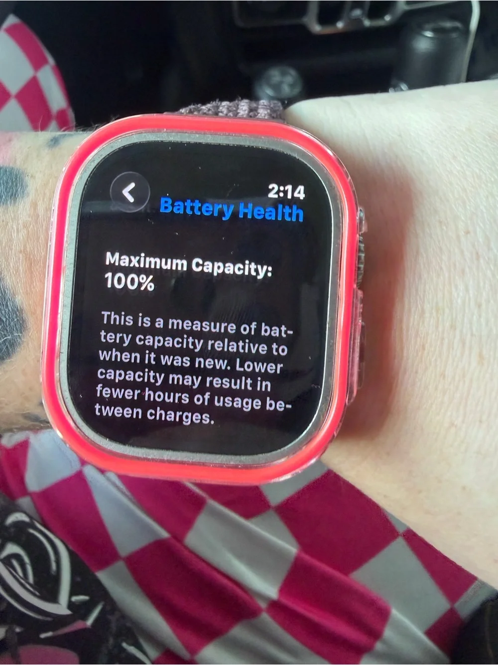 Apple Watch with Red Protective Case and Pink Band